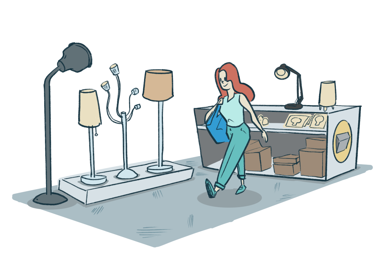 a shopper walking through the lighting section at IKEA